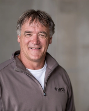 smiling person in professional attire